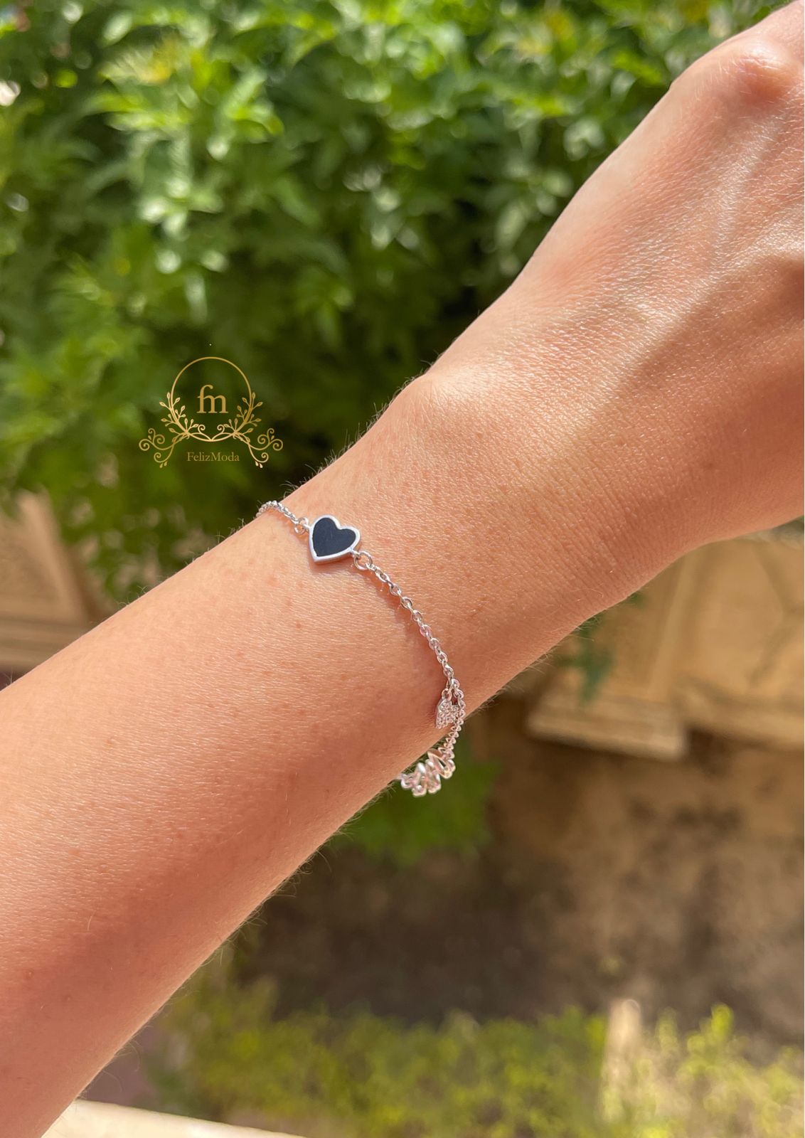 Silver bracelet with black heart and 3 side small hearts - FM20