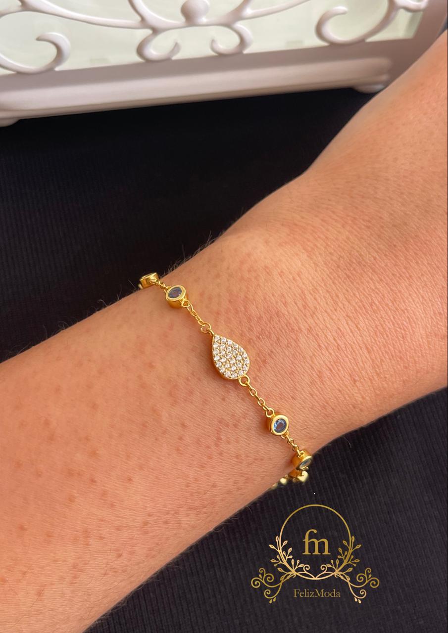 Turquoise stones and oval pendant silver bracelet gold plated