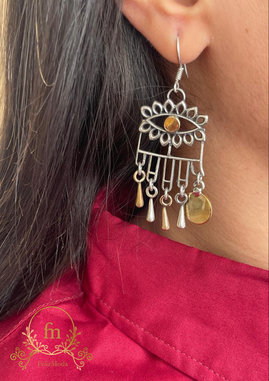 Pharaonic golden eye with dangling pendants