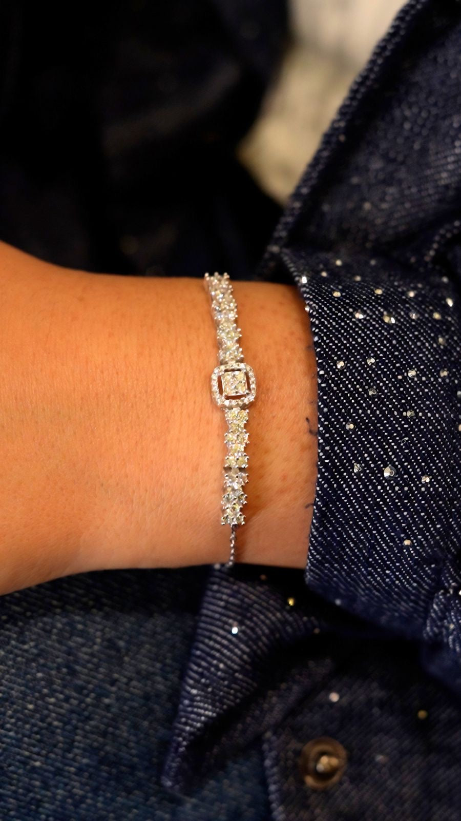 Square zircon stone with side stones silver bracelet