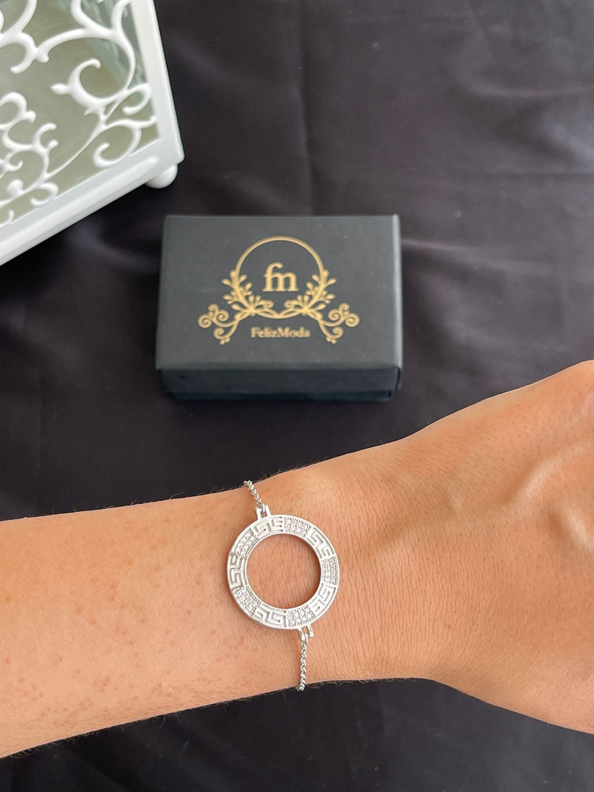 Silver round bracelet with zircon stones