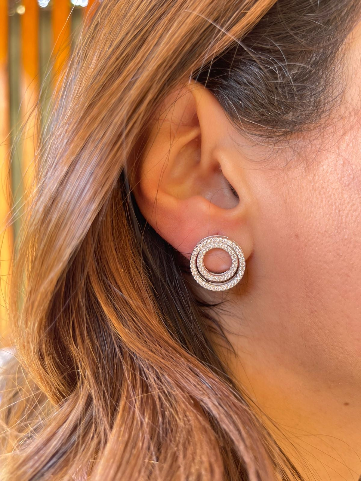 Connected round zircon stones earrings