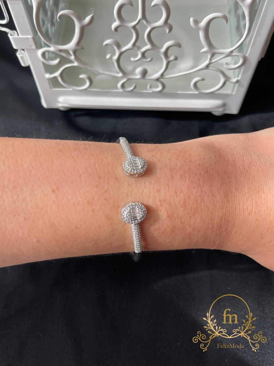 Two oval zircon stones with side stones silver bangle free size adjustable
