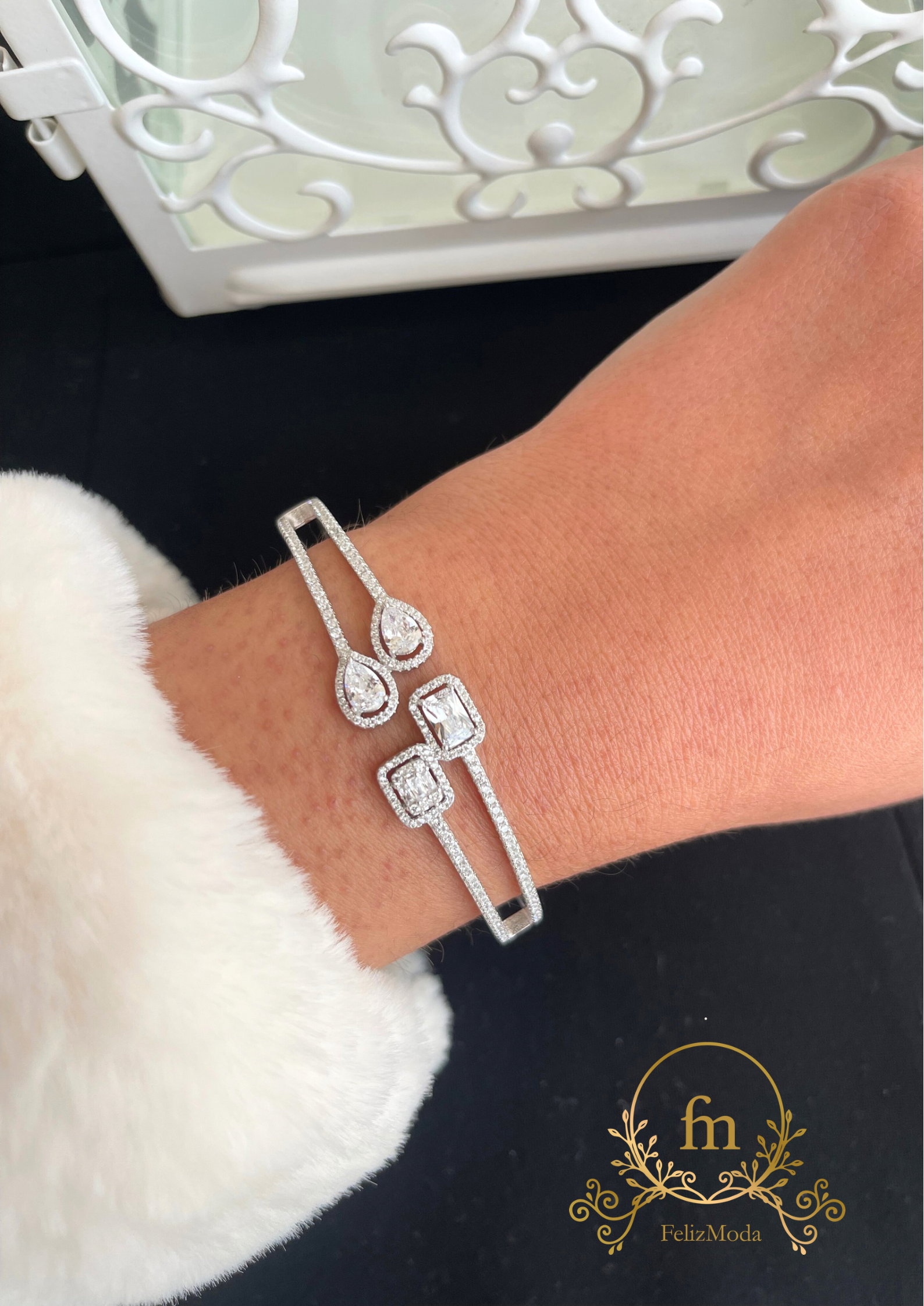 Two oval & two square stones silver bangle