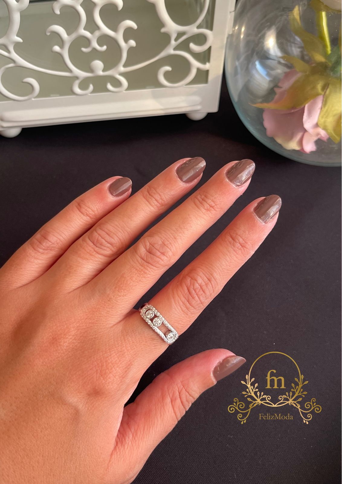 Three moving zircon stones silver ring