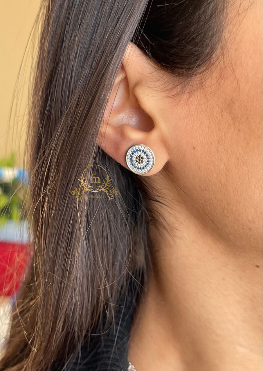 Round silver earrings with blue and black stones
