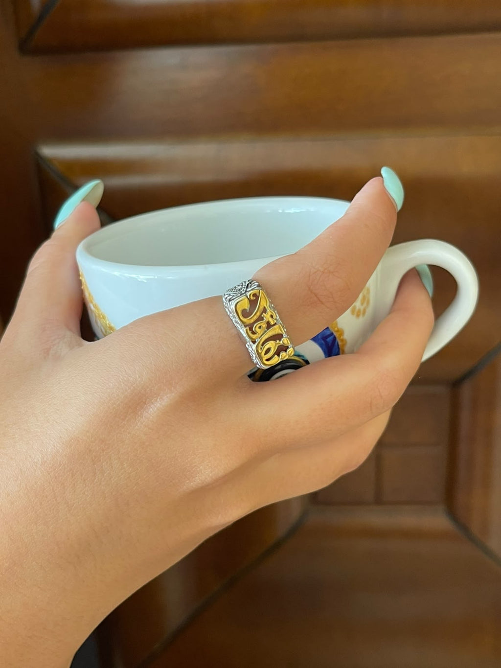 Silver ring تفاؤل with gold plated