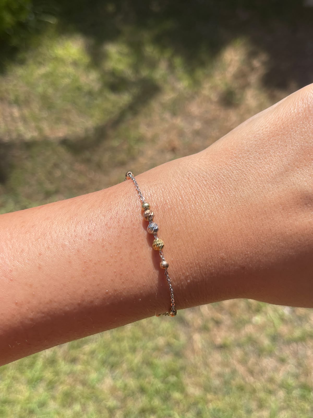 Multiple silver and gold plated beads silver bracelet