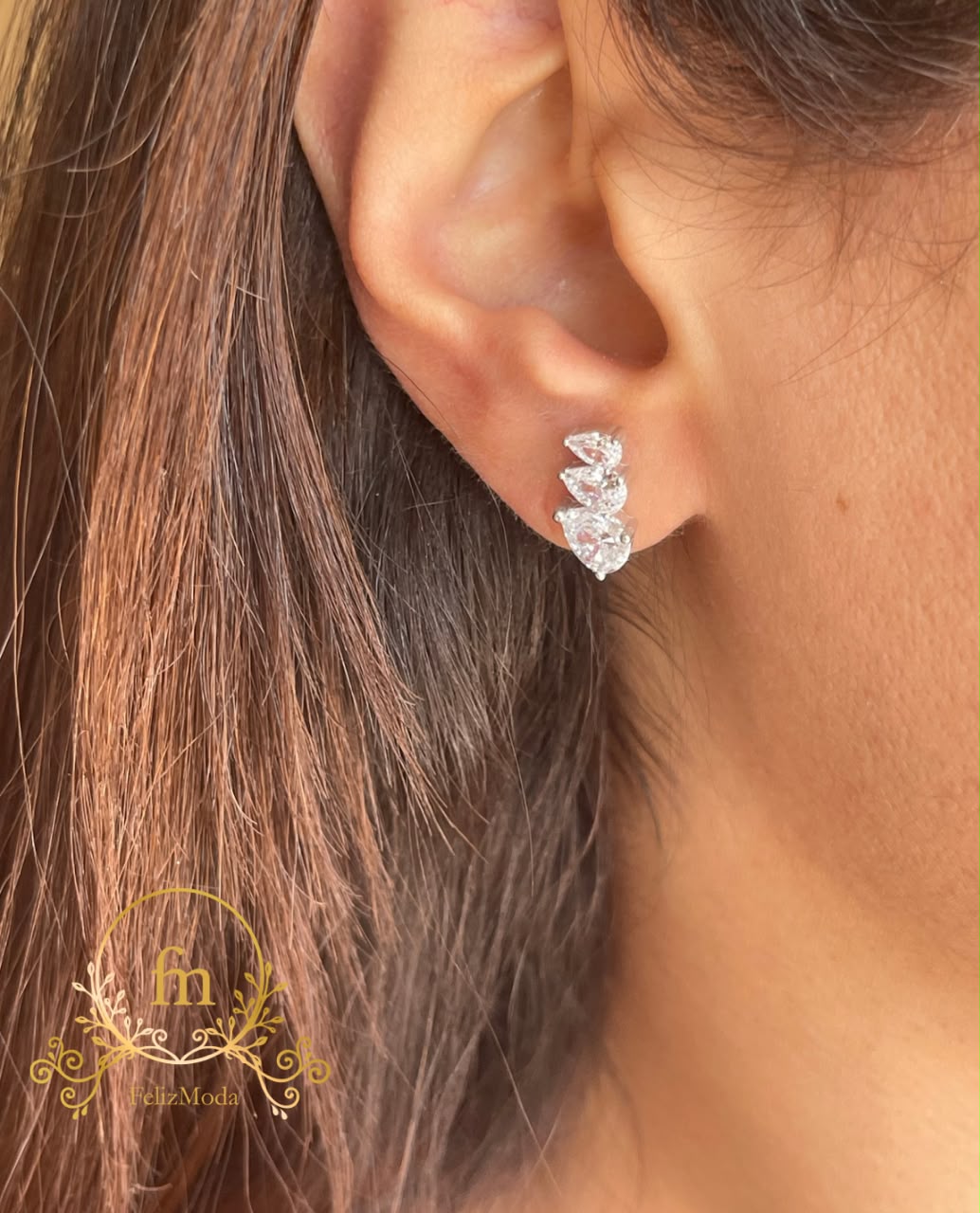 Three zircon stones silver earrings