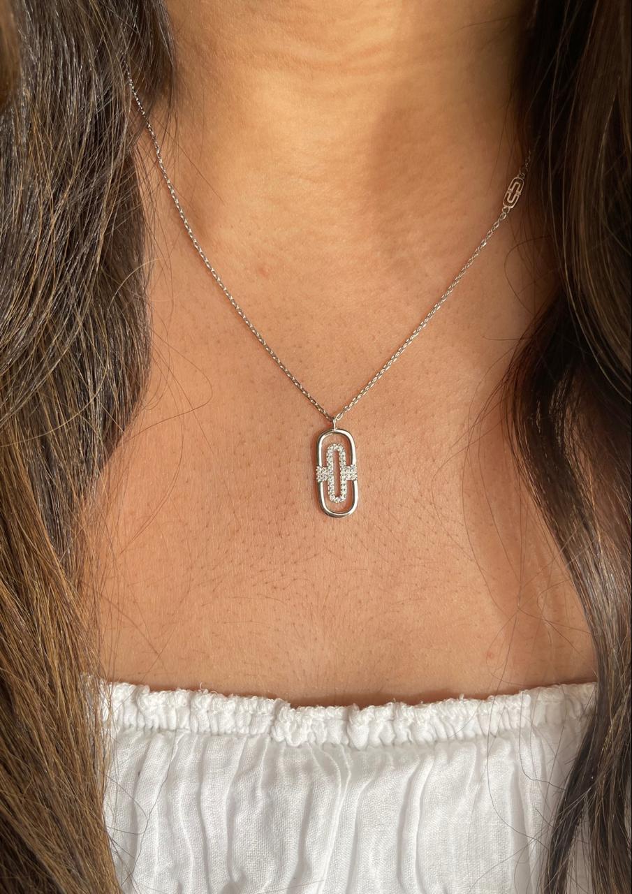 Two oval pendants silver necklace one plain one with stones