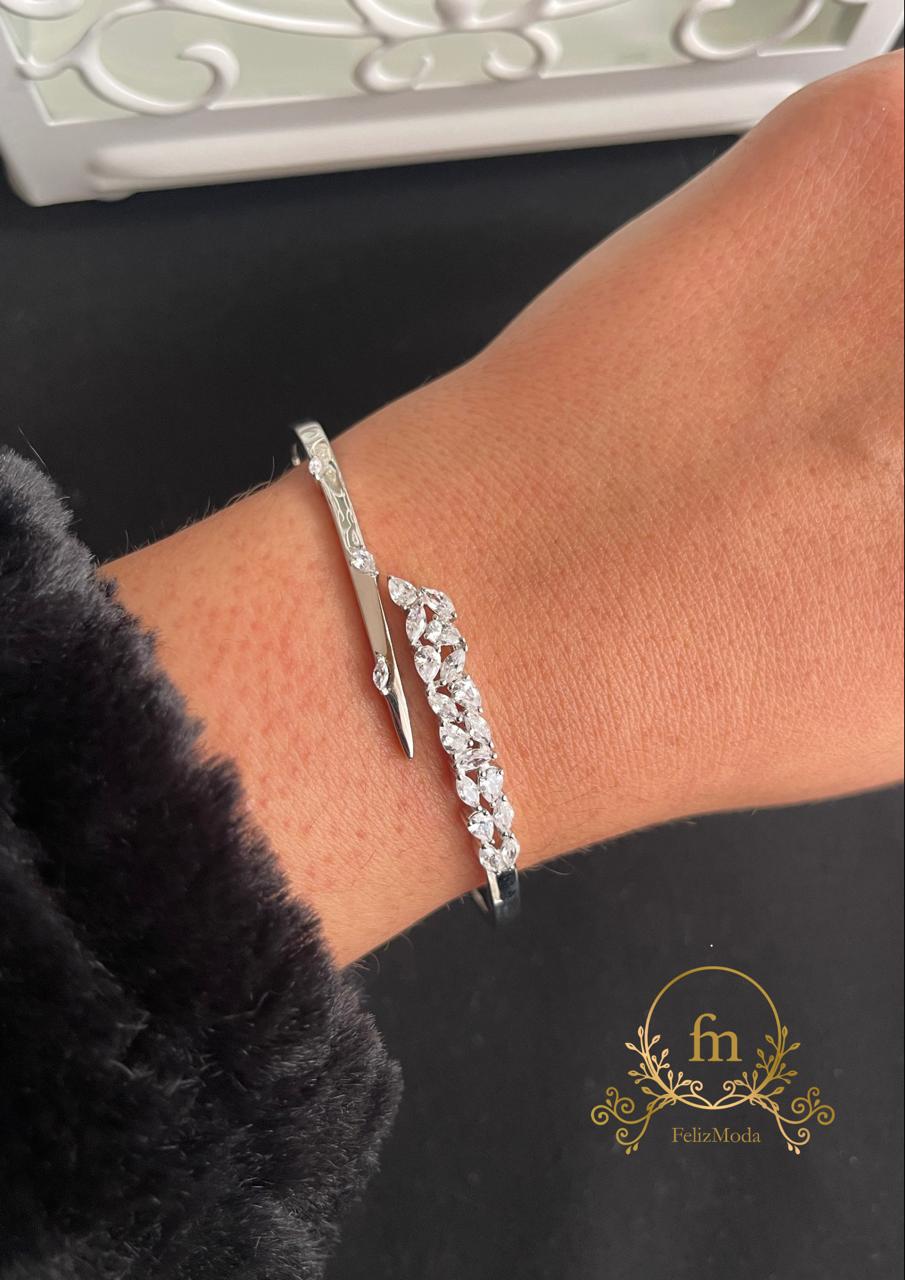 Multiple oval stones with side zircon stones silver bangle