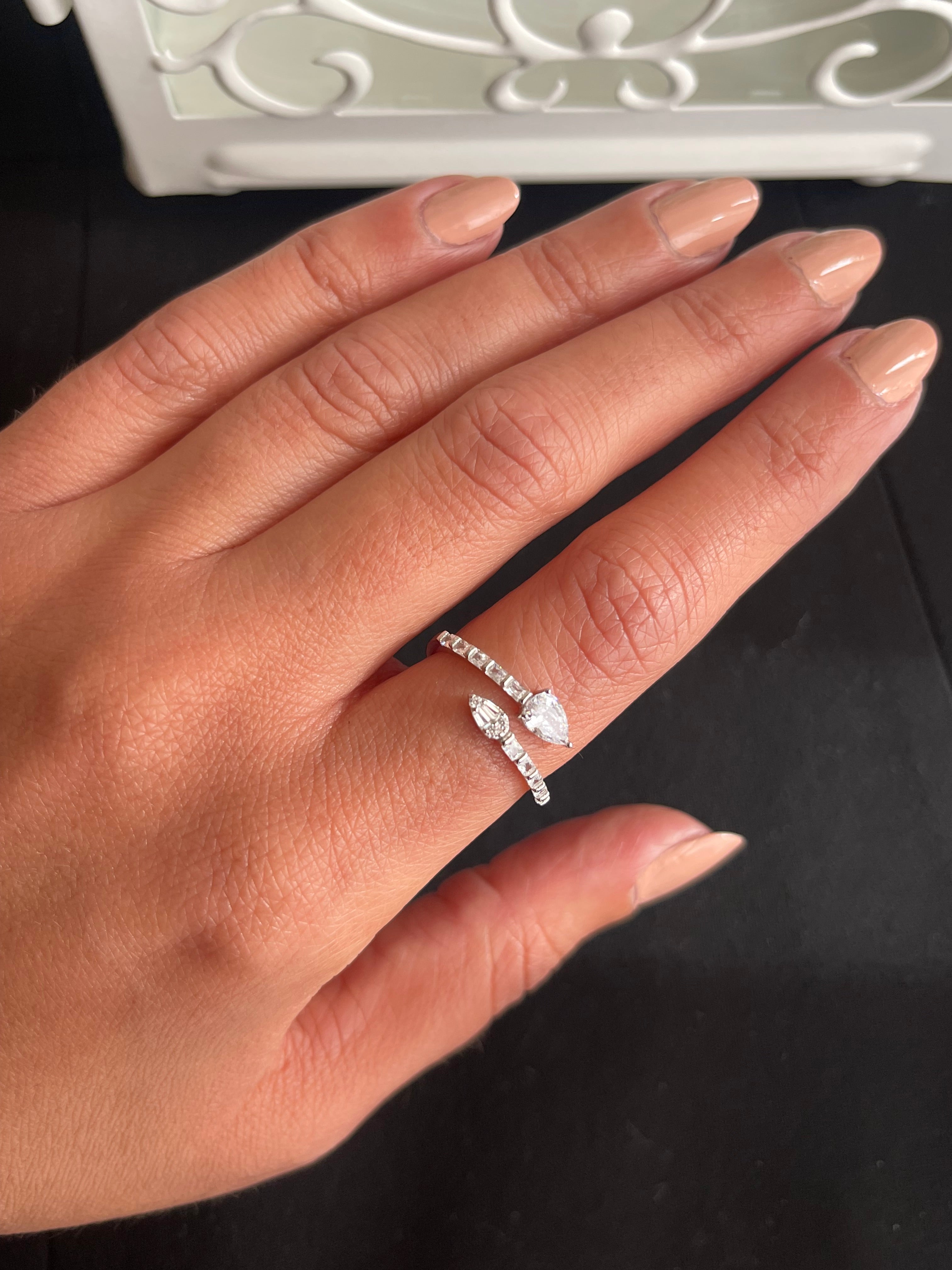 Two oval and multiple crystals silver ring