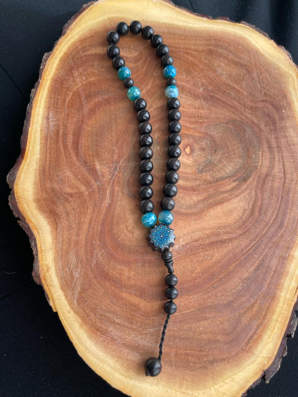 سبحه ٣٣ ابانوس اسود مع عقيق