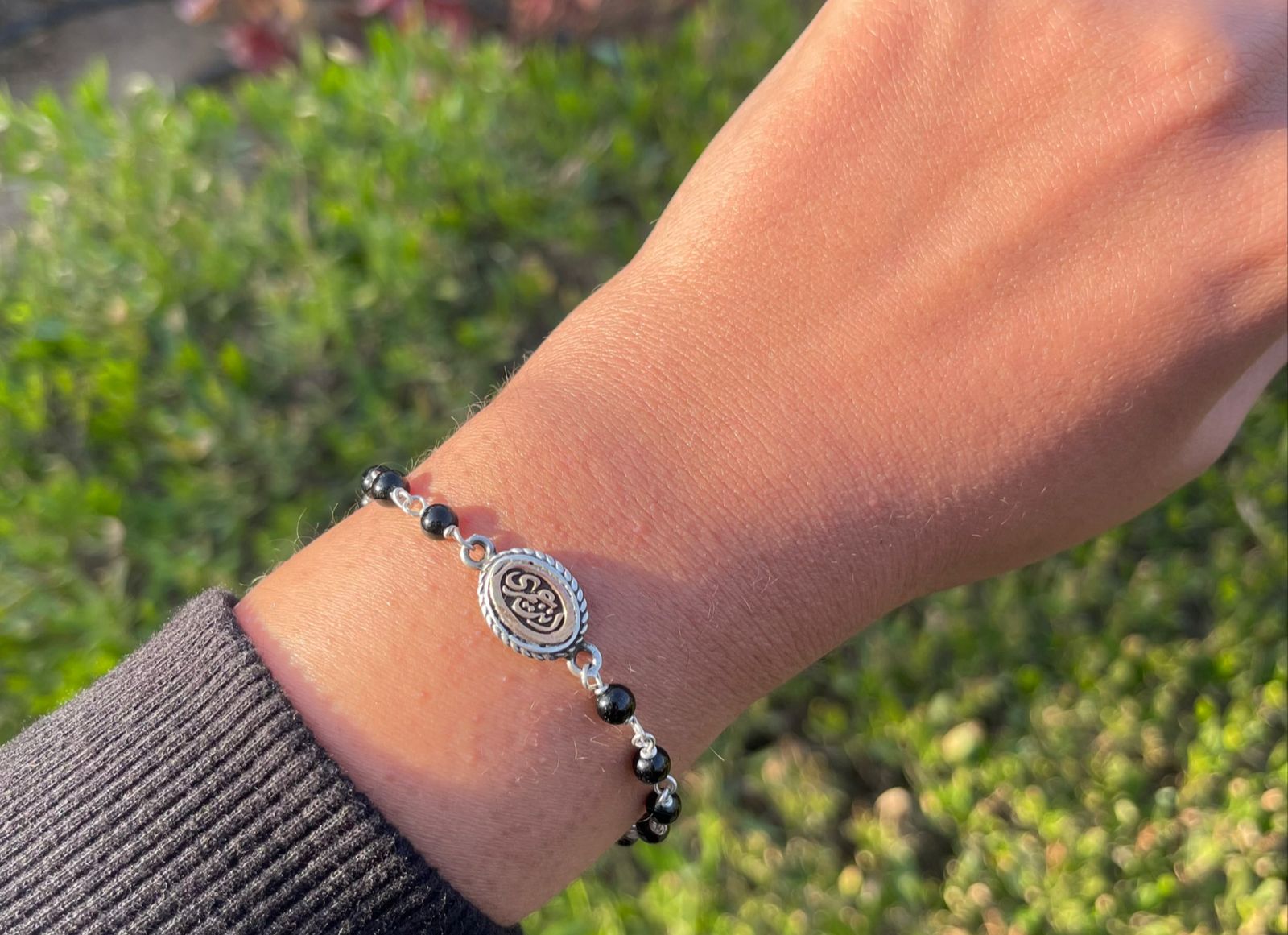 أنت عمرى Silver bracelet with black stones