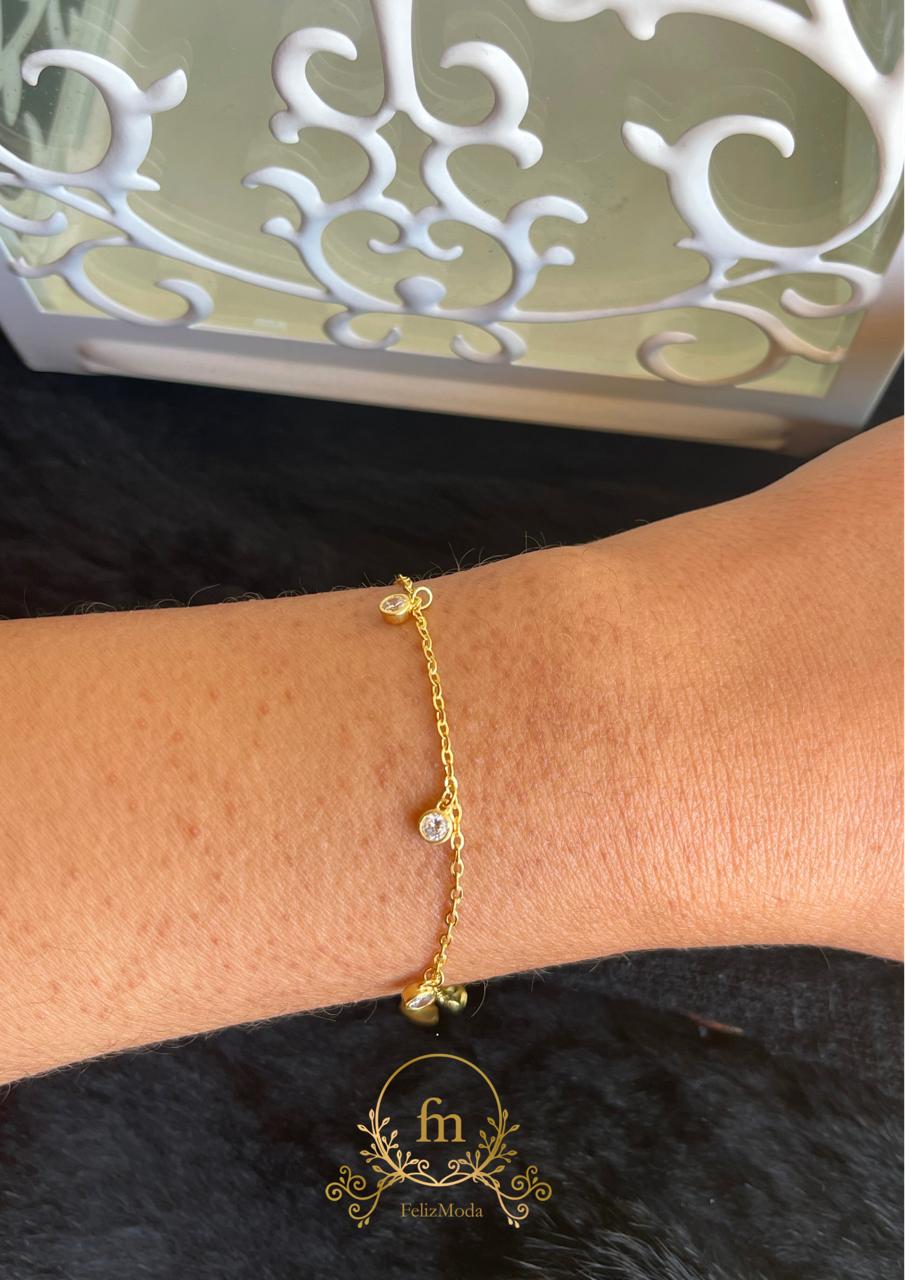 Dangling crystals silver bracelet gold plated with white stones