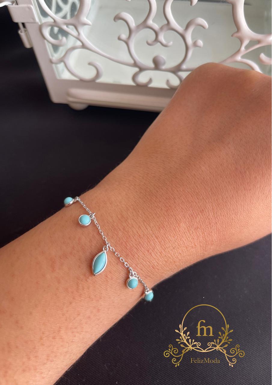 Oval and round Fayrouz stones silver bracelet