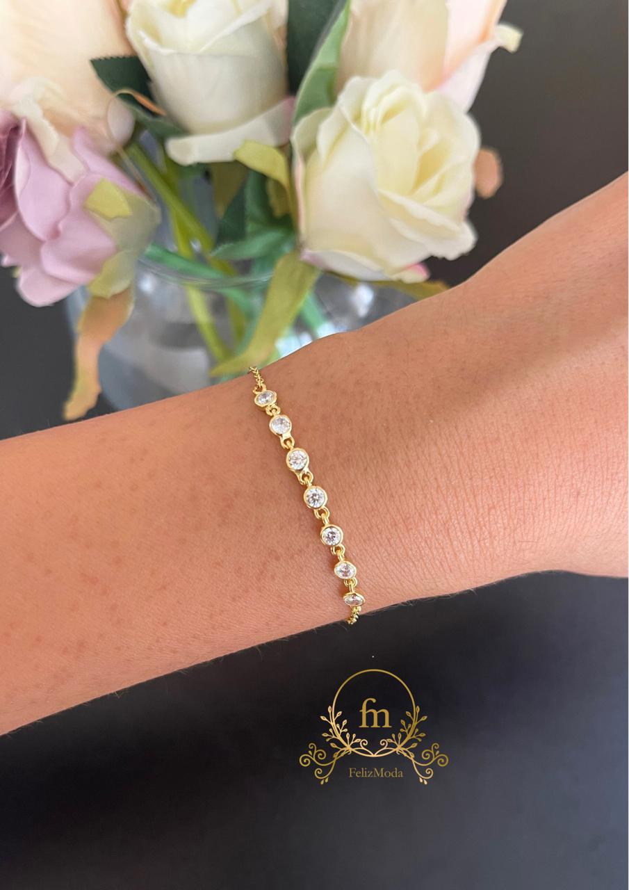 Silver bracelet gold plated with seven silver stones