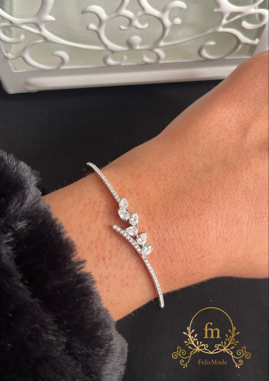 Irregular line of zircon stones silver bangle