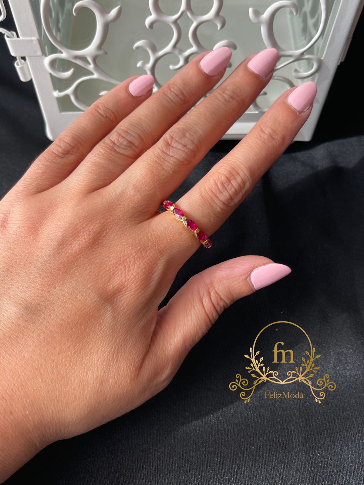 Round silver ring with red stones gold plated