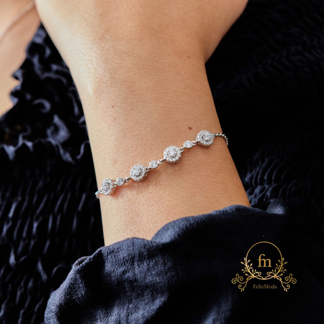 Silver bracelet with 4 round zircon stones