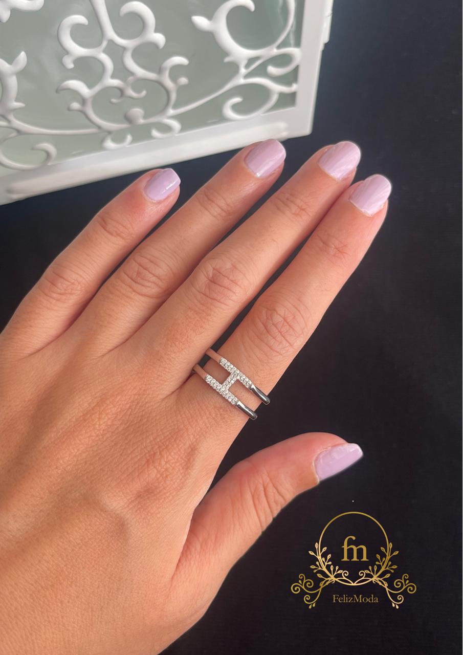 Two layered silver ring connected with stones