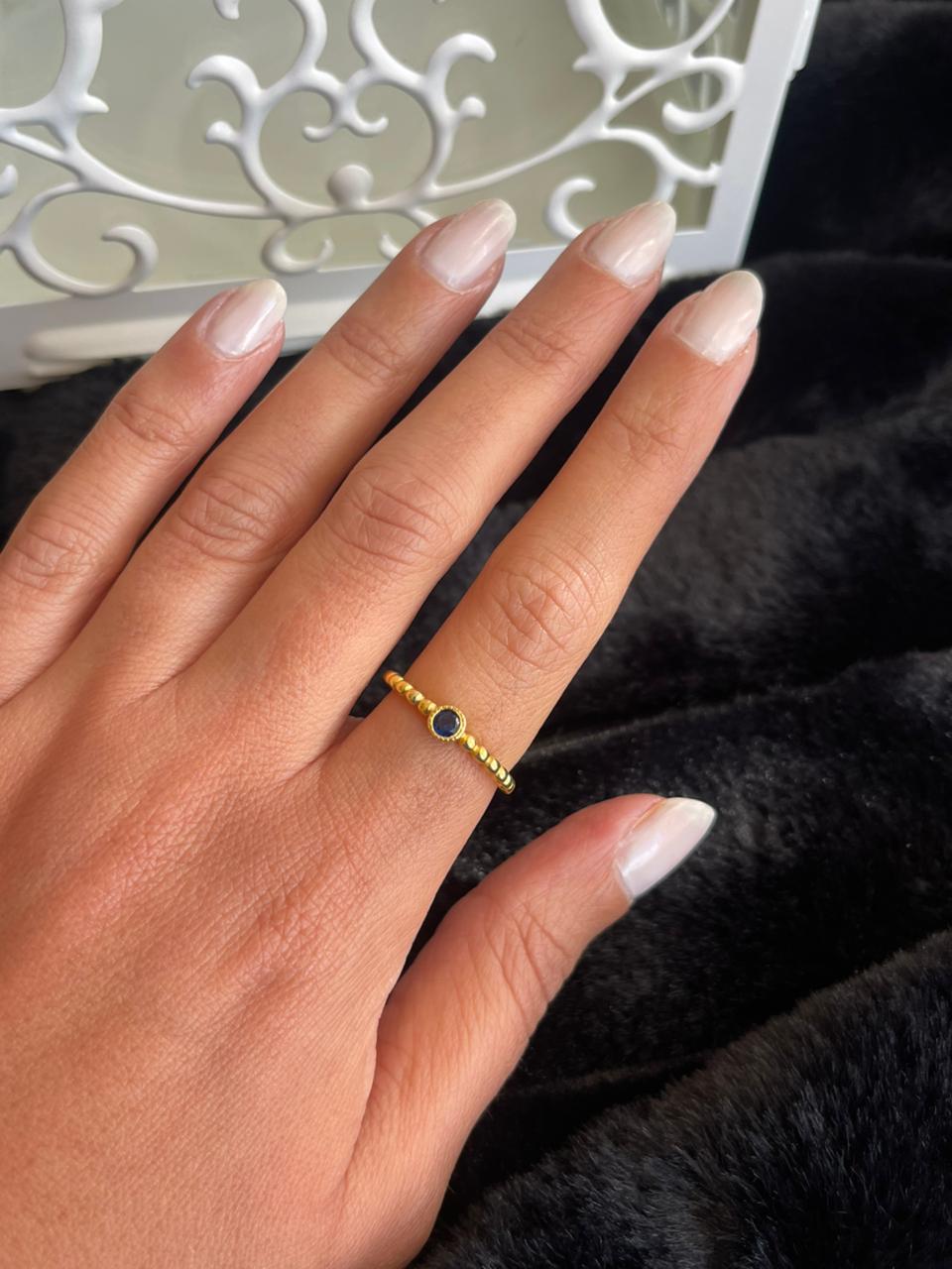 Braided silver ring with blue stone gold plated free size