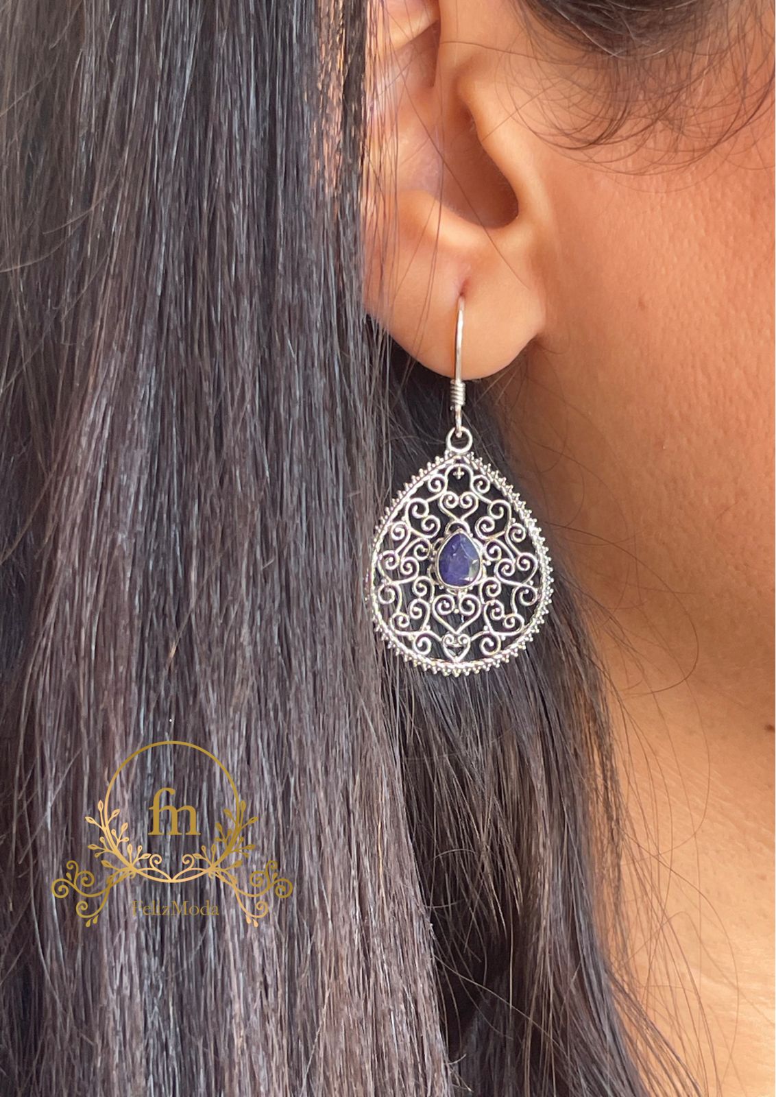 Unique designed earrings with purple stone