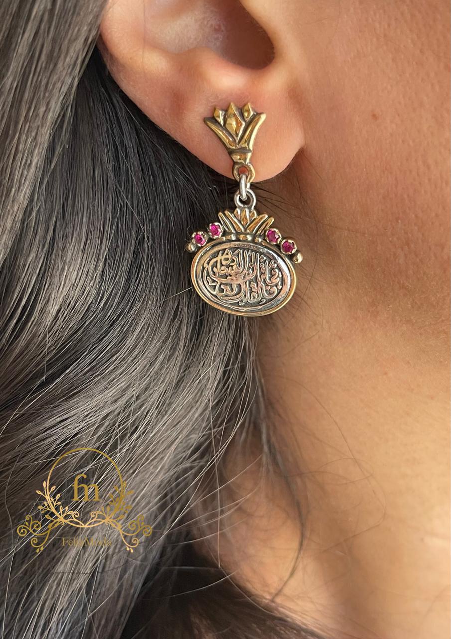 فما تألفه العين فالقلب الفه Silver earrings gold plated with pink stones